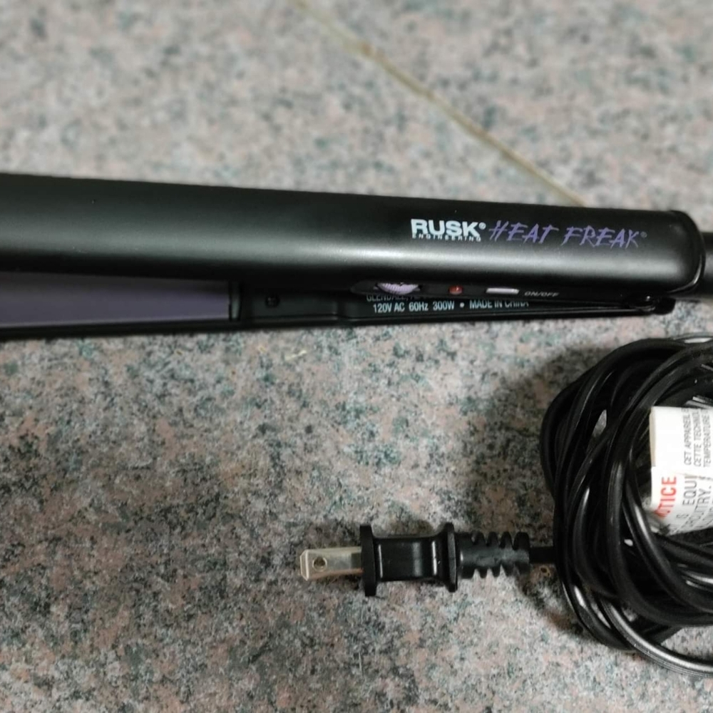 New rusk tourmaline flat iron